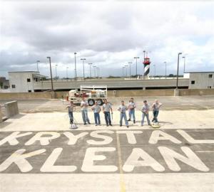 Pressure Washing a parking garage.