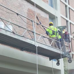 Power Washing side of a commercial building