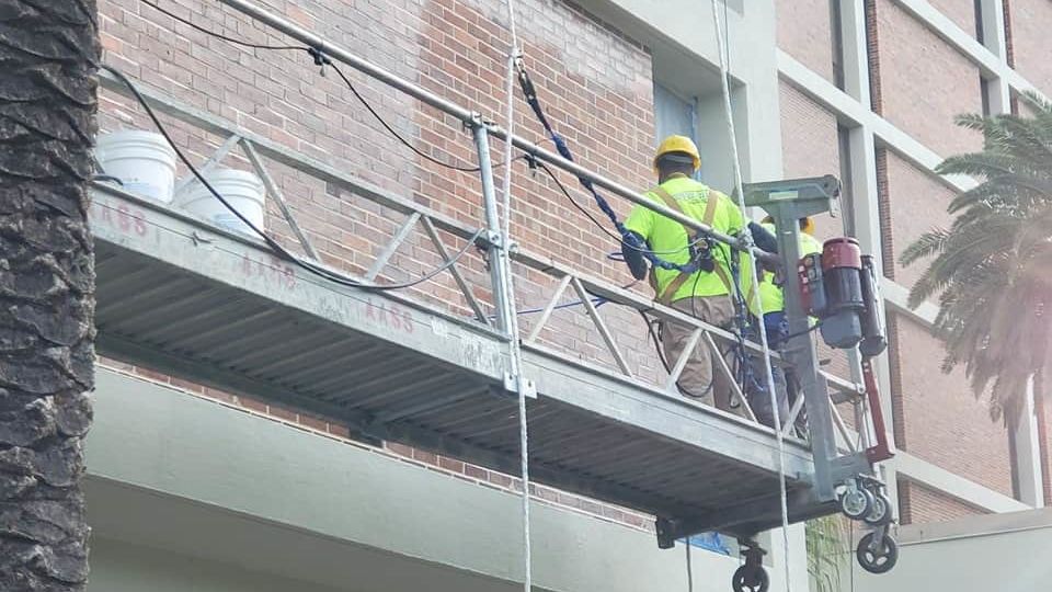 Power Washing side of a commercial building